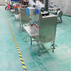 玖柒膏药贴生产机器 小型黑膏药机JQ-DZ08自动滴注滩涂机